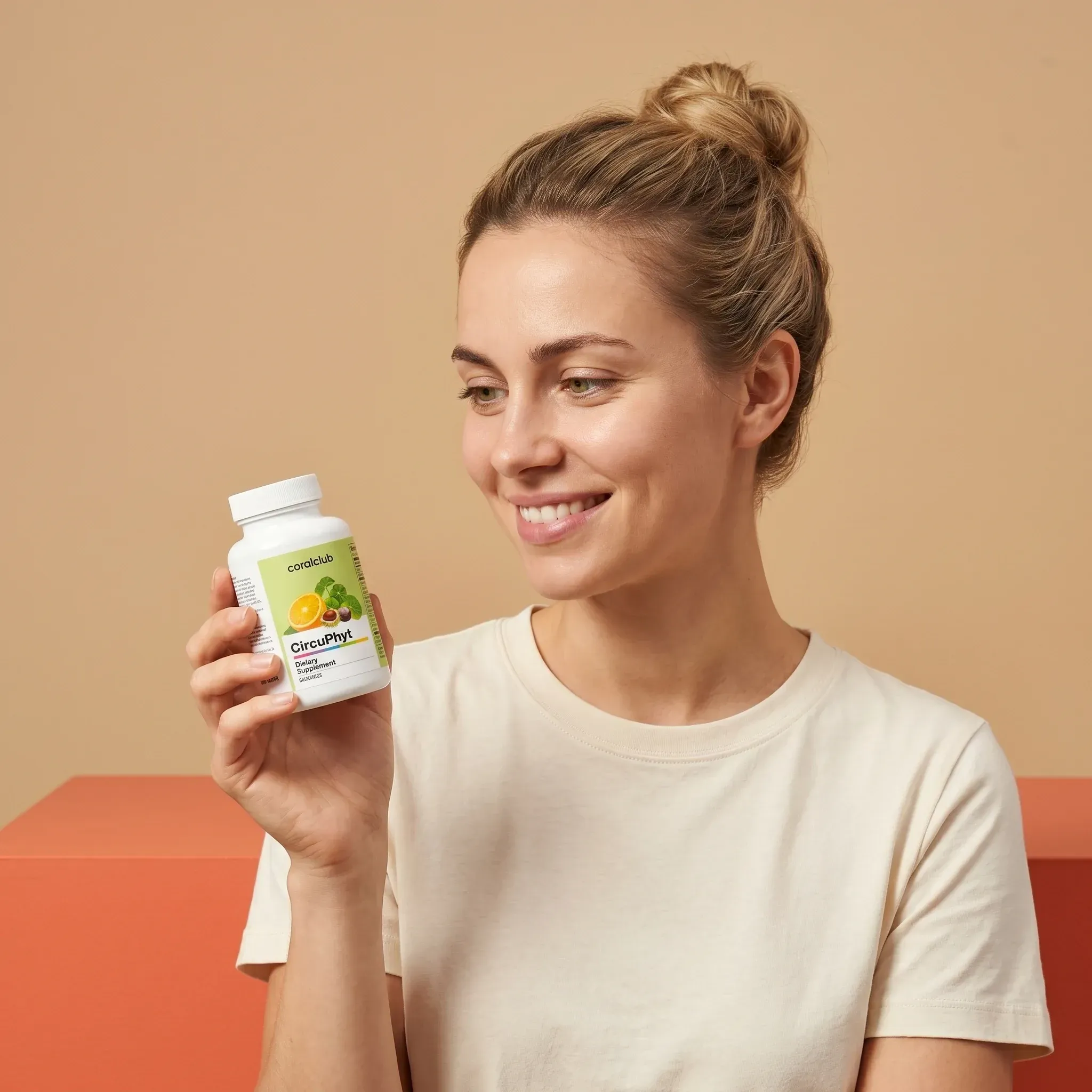Woman holding CircuPhyt supplement bottle in a lifestyle setting with a neutral background.