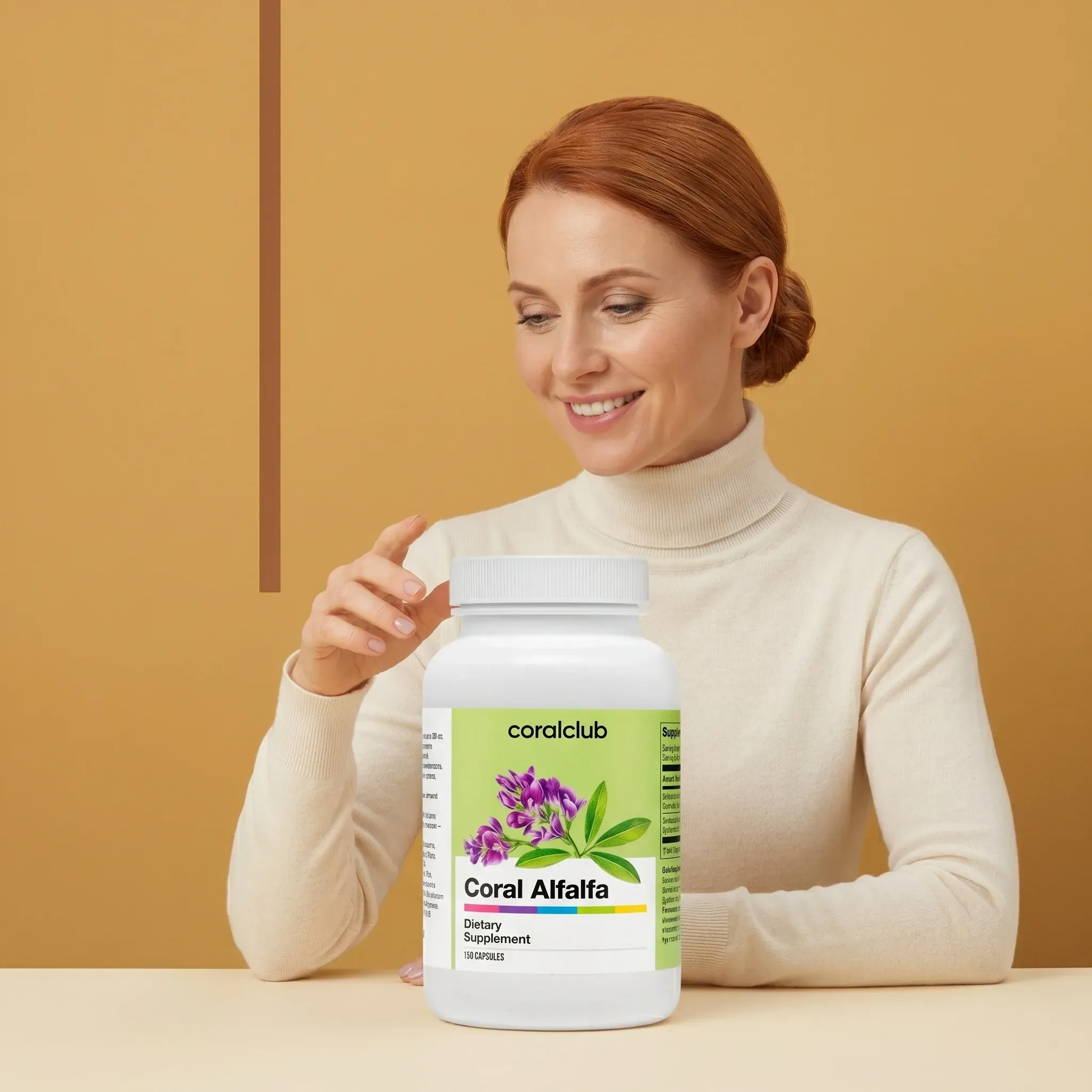 Woman smiling while holding a bottle of Coral Alfalfa dietary supplement against a warm background.