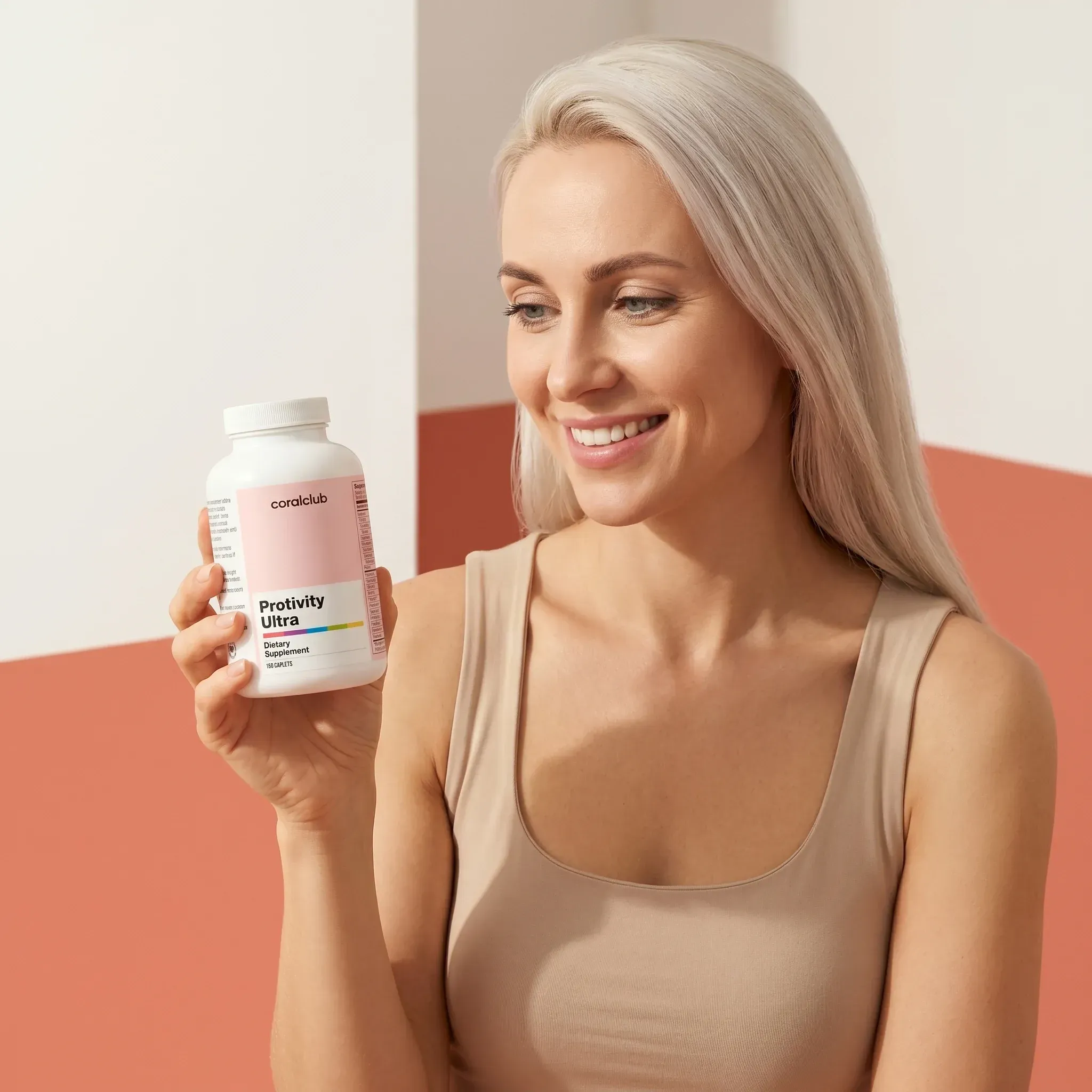 Woman holding Protivity Ultra supplement bottle in a modern lifestyle setting.