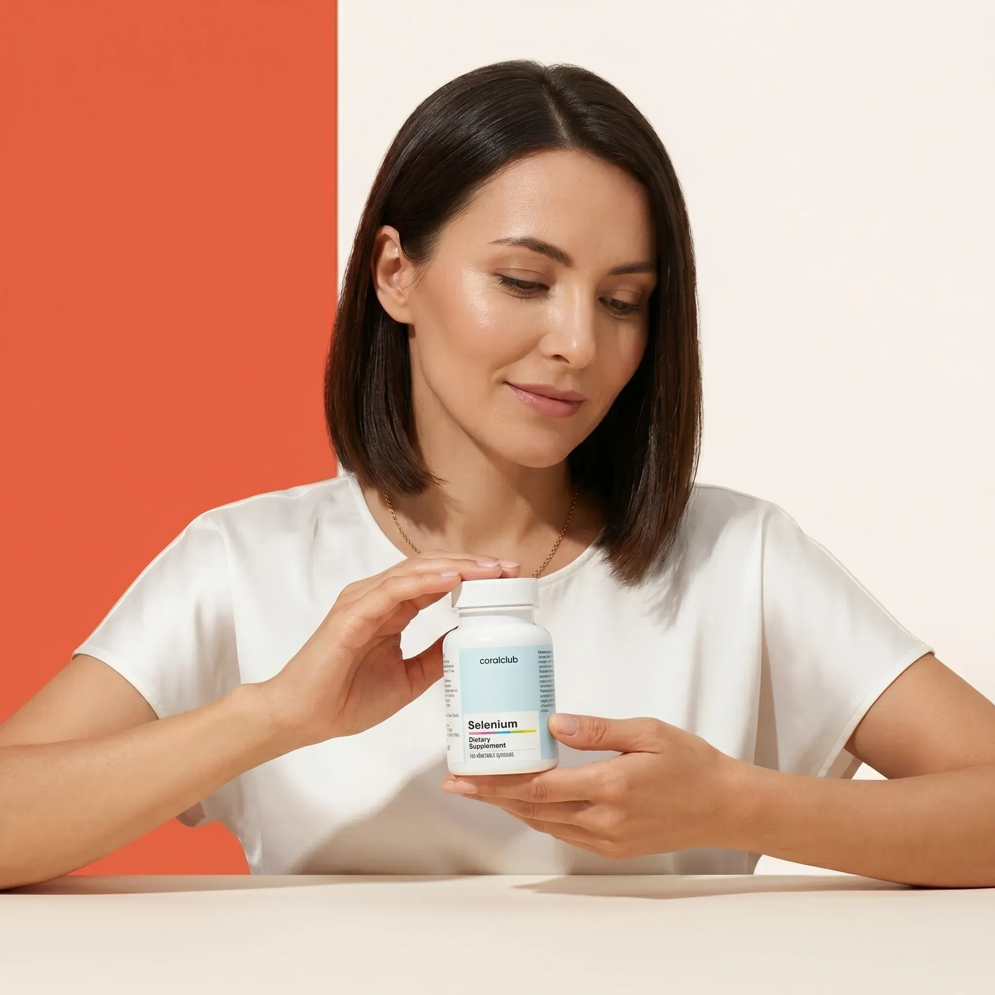 Selenium lifestyle supplement held by a woman, featuring a clean design and soft color palette.