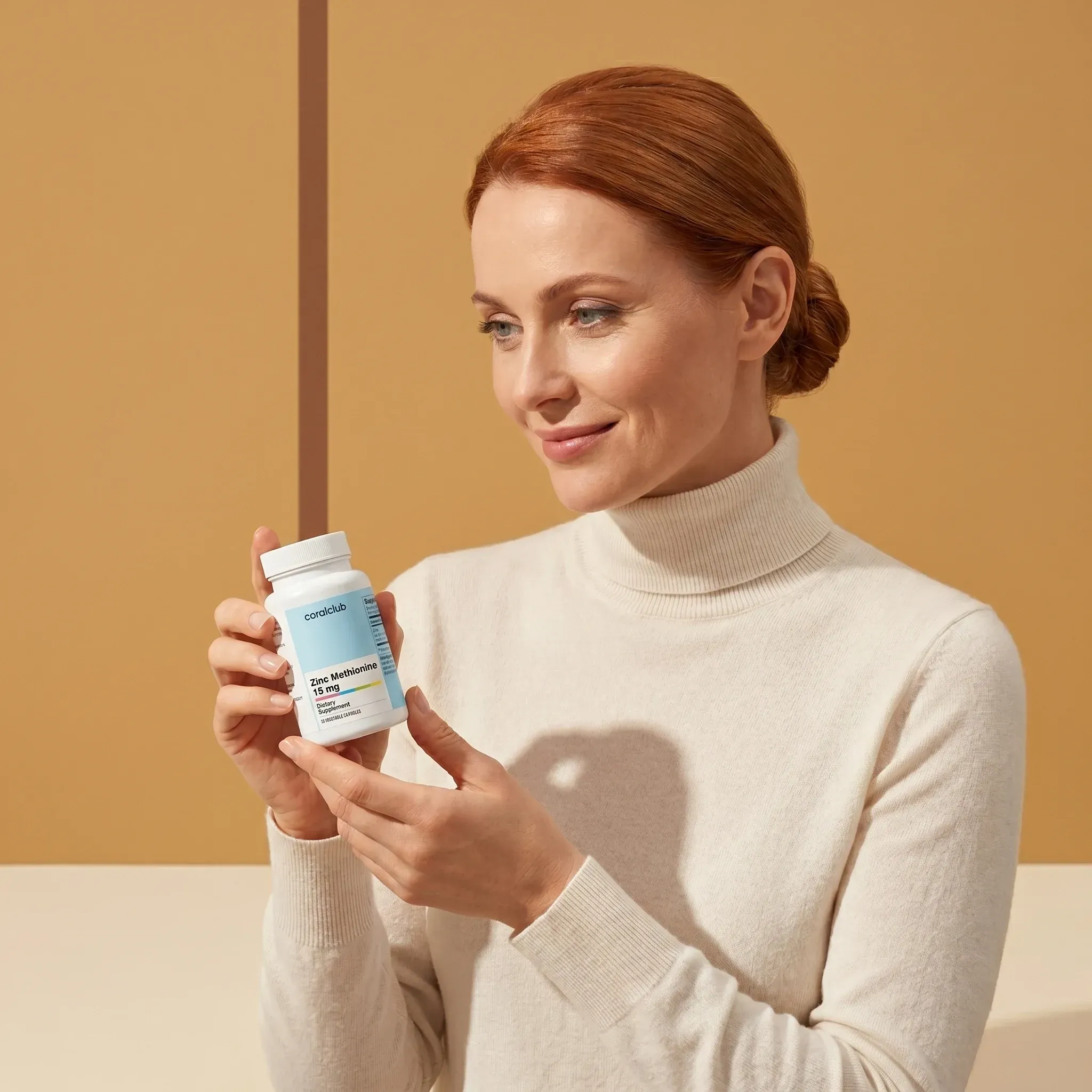 Zinc Methionine 15 mg lifestyle image with a woman holding the supplement bottle.